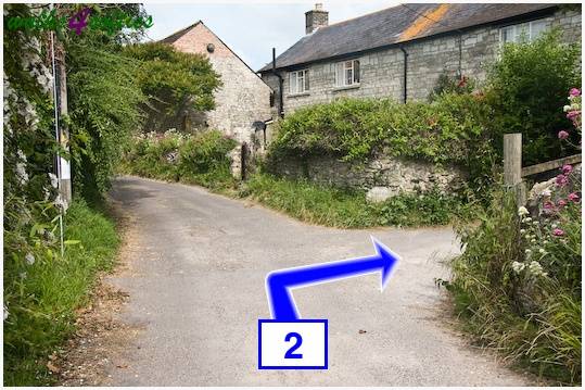 Walk direction photograph: 2 for walk Maiden Castle, The Brewers Arms, Martinstown, Dorset, South West England.